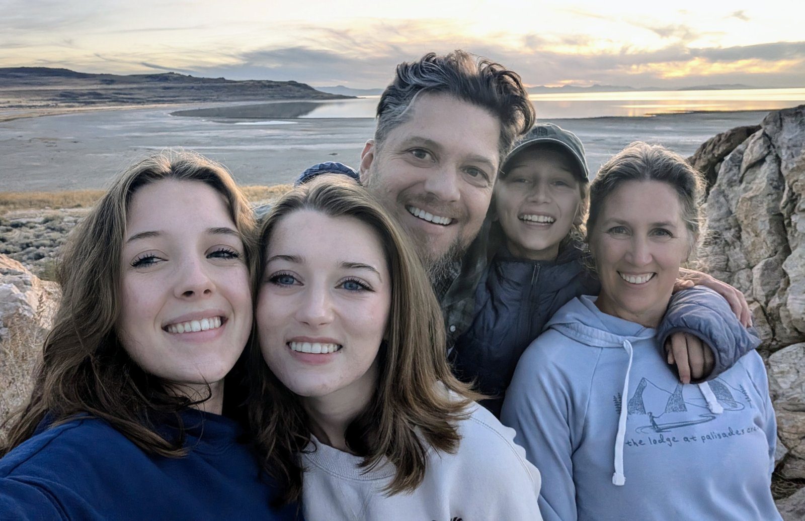 Ben Page with his family out on the salt flats at sunset.